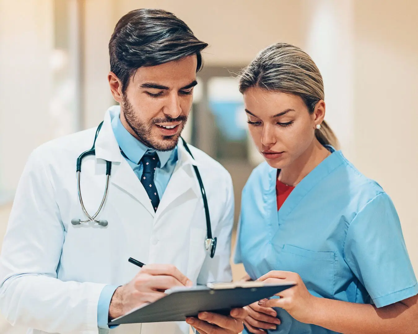 Healthcare professionals discussing patient information