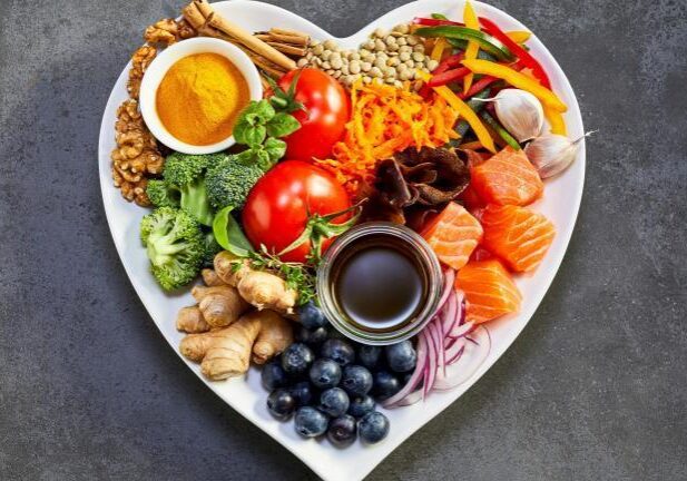 Heart plate filled with nutritious food variety
